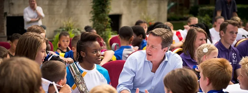 students talking with a politician